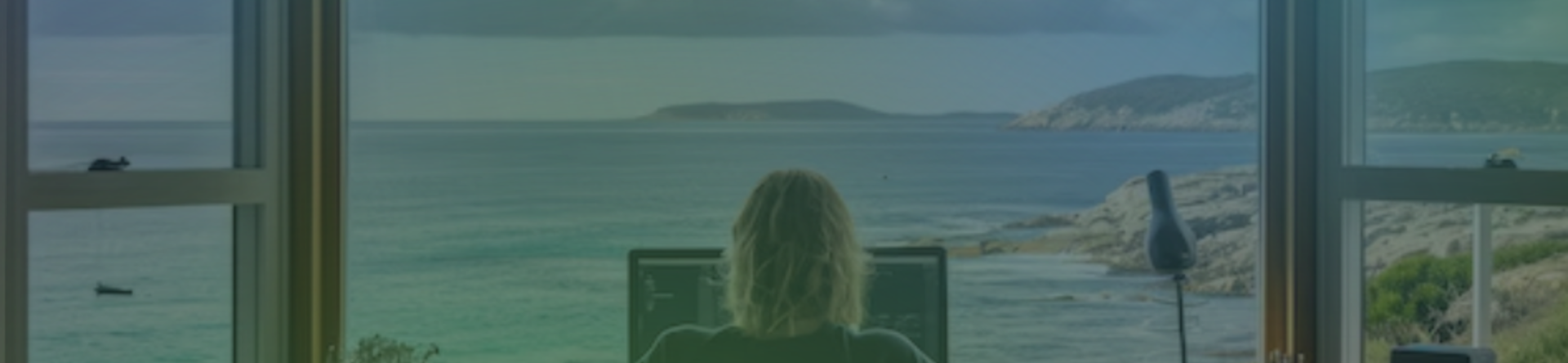Young girl smartworking with a window overlooking the sea in front of her