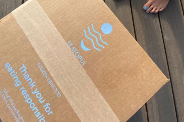 cardboard packaging branded seatopia with the words 'thank you for eating responsible'